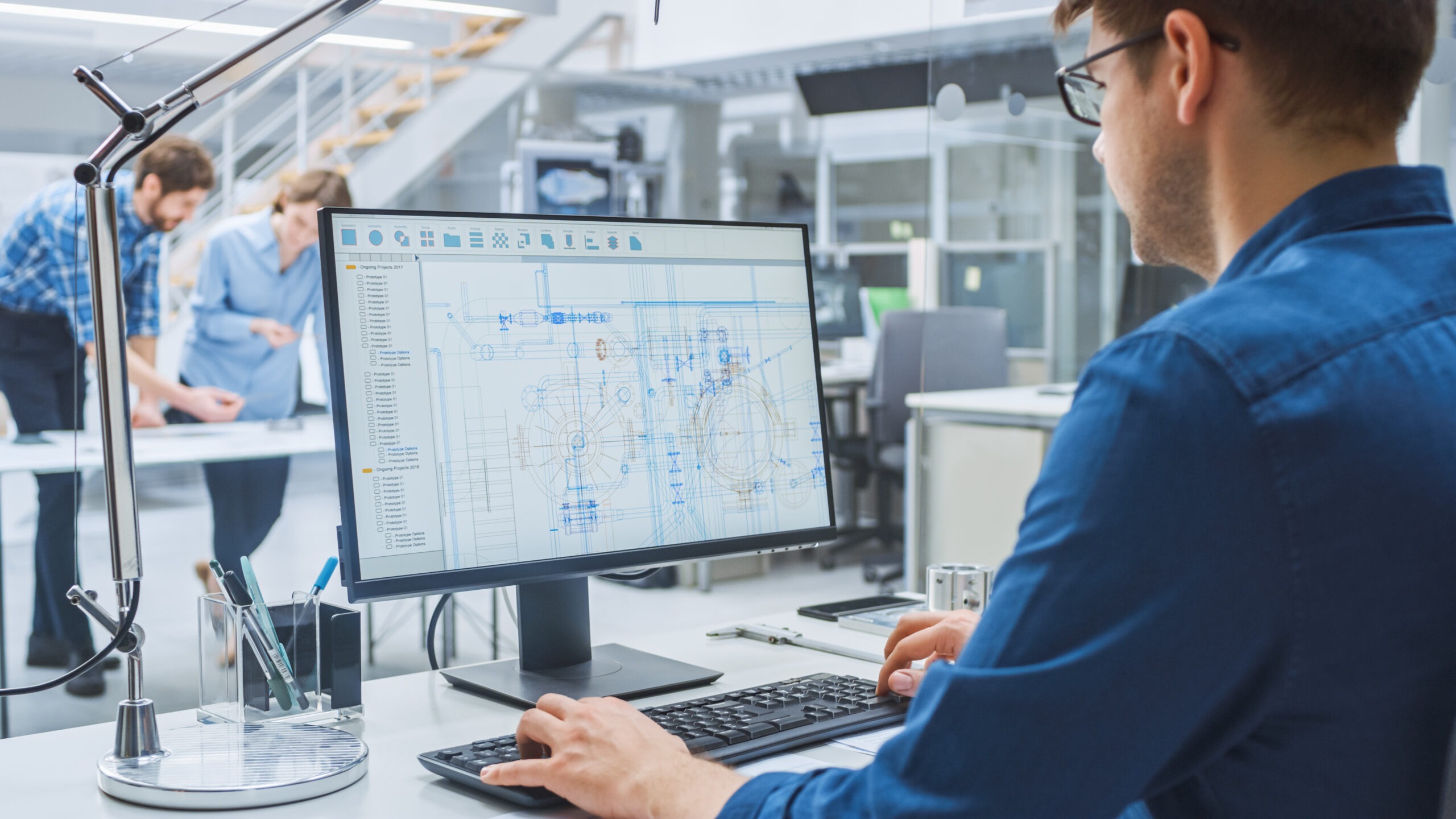 Design Engineer Working on CAD Layout for Concrete Plant